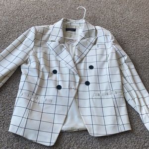 BRAND NEW with tags!! Women’s blazer. White and black striped.
